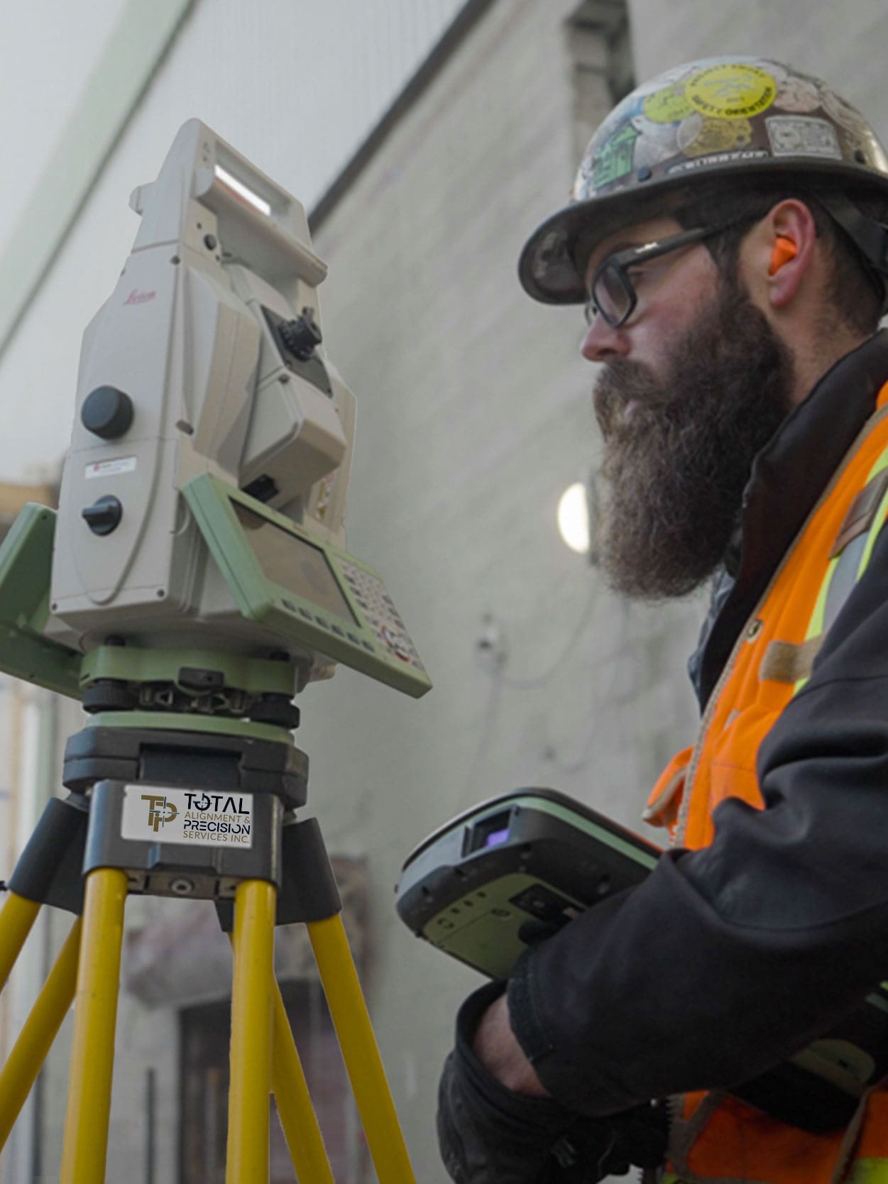 Total Precision employee, Nick uses alignment equipment on site