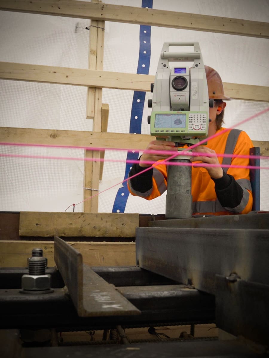 Surveyor uses alignment laser